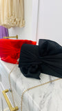 Put it in a Bow Clutch